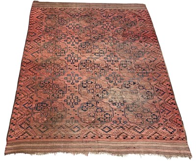 Lot 57 - A large antique red ground Turkmen carpet, 275...