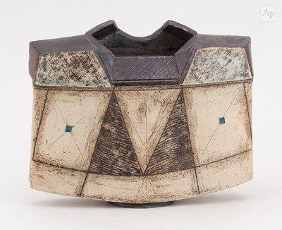Lot 748 - An angular stoneware spade vase partially...