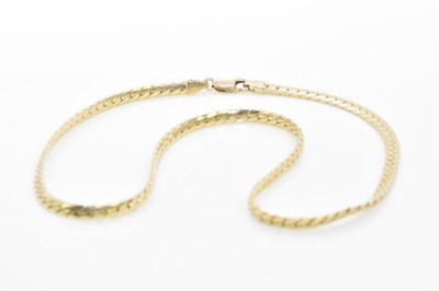 Lot 1045 - A 9ct gold flat link chain, 19.85g
