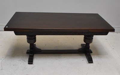 Lot 1042 - A reproduction Priory style draw-leaf...