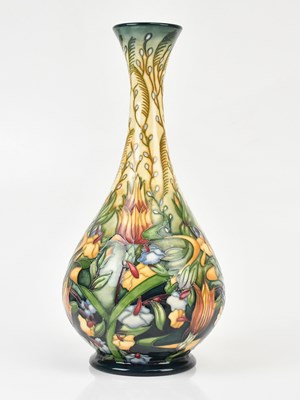Lot 1561 - MOORCROFT; a large baluster form vase...