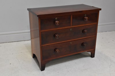 Lot 1205 - A Victorian mahogany chest of two short and...