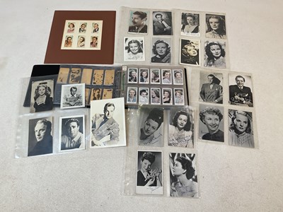 Lot 207 - A book of cigarette cards and photo album of...