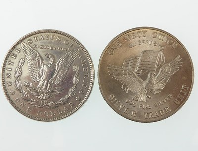 Lot 955 - An 1886 peace silver dollar and 1981 fine...