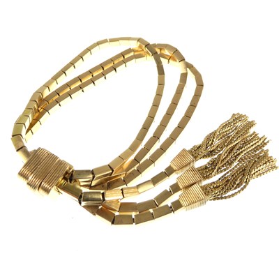 Lot 1106 - A fancy 18ct gold bracelet of three strands of...