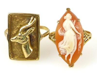 Lot 1104 - Two gold rings, one a cameo example of lozenge...