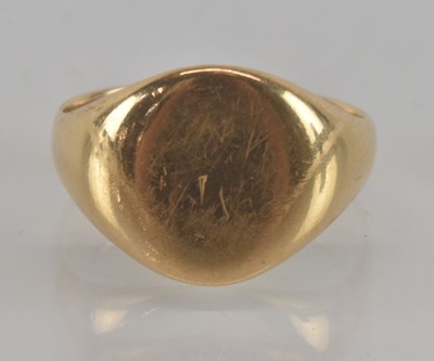 Lot 1247 - An 18ct gold vintage signet ring, the oval...