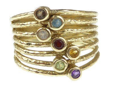 Lot 1072 - A modern 9ct gold gemstone ring, the top...