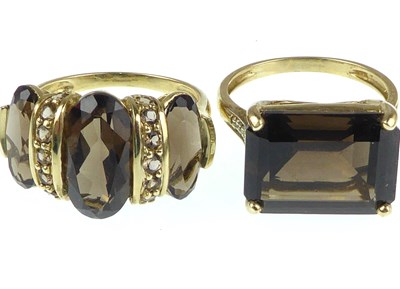 Lot 1088 - Two 9ct gold rings, one with corner claw set...
