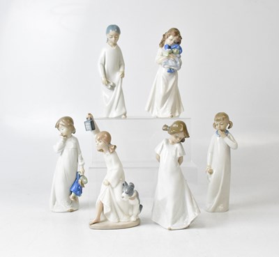 Lot 238 - NAO; six figures of children in nightdresses,...