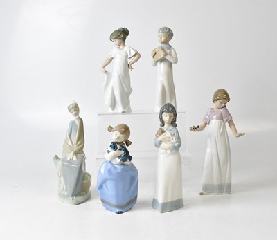Lot 236 - NAO; five figures of children and a figure of...