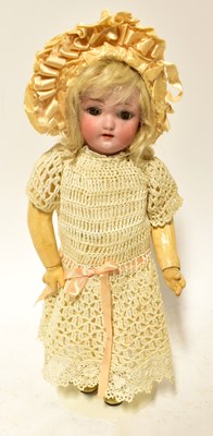 Lot 496 - SIMON & HALBIG; a bisque head 'walking' doll,...