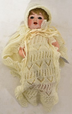 Lot 318 - SIMON & HALBIG; a German bisque headed doll...