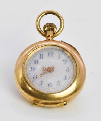 Lot 1138 - A 14ct gold crown wind open face fob watch,...