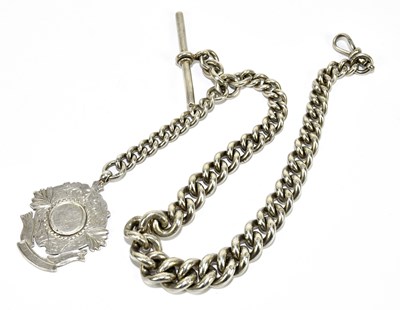 Lot 1845 - A hallmarked silver graduated curb link Albert...