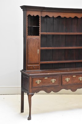Lot 35 - A late 18th century crossbanded oak dresser,...