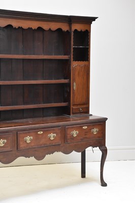 Lot 35 - A late 18th century crossbanded oak dresser,...