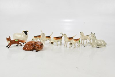 Lot 1620 - BESWICK; ceramic figures comprising a fox and...