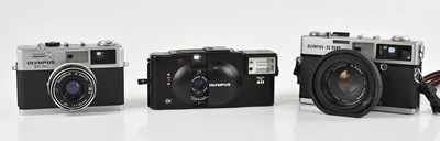 Lot 2369 - OLYMPUS; three 35mm film cameras, to include a...