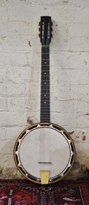 Lot 1293 - CLAVERO; a 1920s six string banjo, with...
