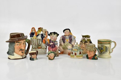 Lot 1598 - A collection of figures and character jugs...