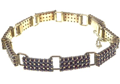 Lot 1125 - A Continental gilt silver (835 grade) garnet...