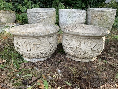 Lot 1239 - A pair of reconstituted stone planters, with...