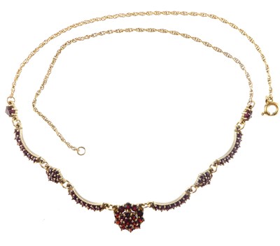 Lot 1162 - An early 20th century red stone cluster...