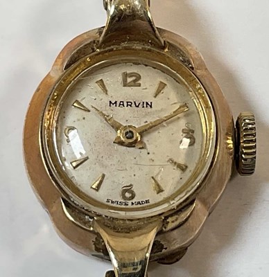Lot 1126 - MARVIN; a 9ct yellow gold lady's vintage...
