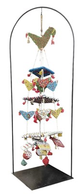 Lot 601 - A Native American beadwork wind chime,...