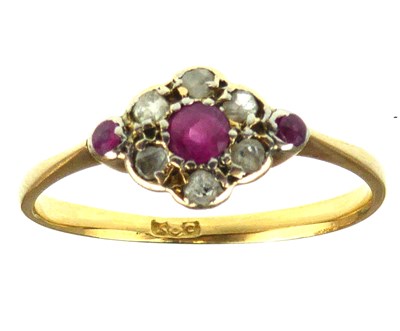 Lot 1011 - A late 19th/early 20th century 18ct gold ruby...