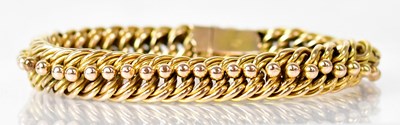 Lot 825 - A 15ct yellow gold woven chain link bracelet...