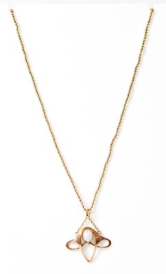 Lot 851 - A 9ct gold Art Nouveau pendant set with...