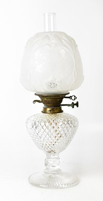 Lot 119 - A cut glass oil lamp with pineapple cut shaped...