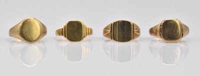 Lot 1053 - Four 9ct gold signet rings, combined approx 17....