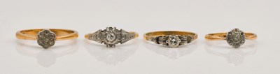 Lot 1072 - Four 18ct gold diamind set rings, combined...