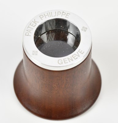 Lot 613 - PATEK PHILIPPE; a boxed turned wood and chrome...