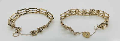 Lot 1081 - Two 9ct gold gate link bracelets, combined...