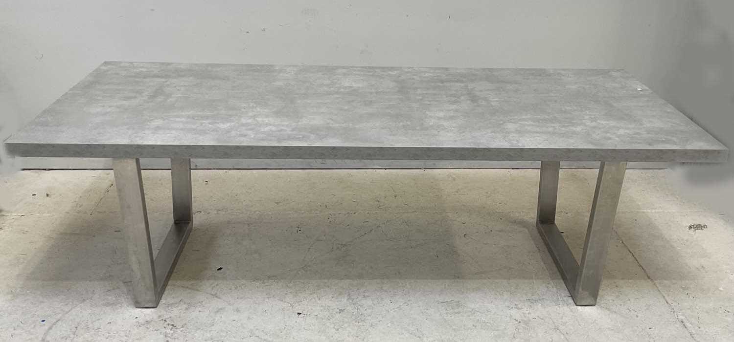 Lot 32 - A modern marble effect top dining table with...