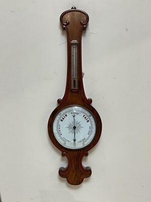 Lot 395 - A Victorian rosewood effect wheel barometer,...
