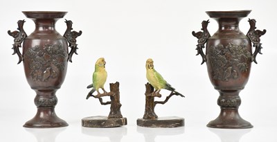 Lot 410 - A pair of painted spelter budgie bookends,...