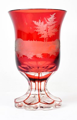 Lot 220 - A 19th century Bohemian ruby glass vase etched...