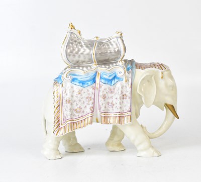 Lot 147 - A porcelain spill vase in the form of an...