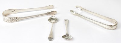 Lot 749 - Two pairs of Georgian silver sugar tongs, each...