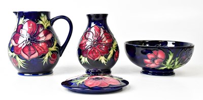 Lot 310 - MOORCROFT; four 'Anemone' pattern pieces,...