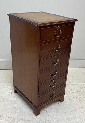 Lot 71 - A reproduction oak three drawer filing cabinet...