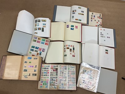 Lot 2104 - Eleven world stamp albums to include stamps...
