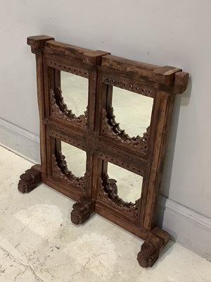 Lot 1527 - A possibly Indian carved window framed...