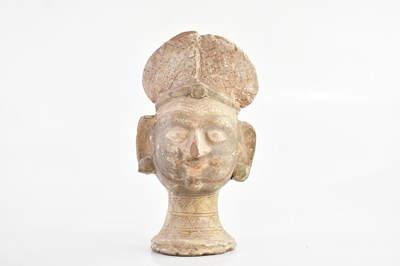 Lot 1517 - An antique terracotta bust of a deity, with...