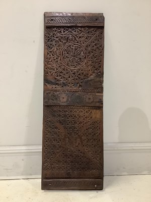 Lot 1547 - A carved panel, possibly a door or window...
